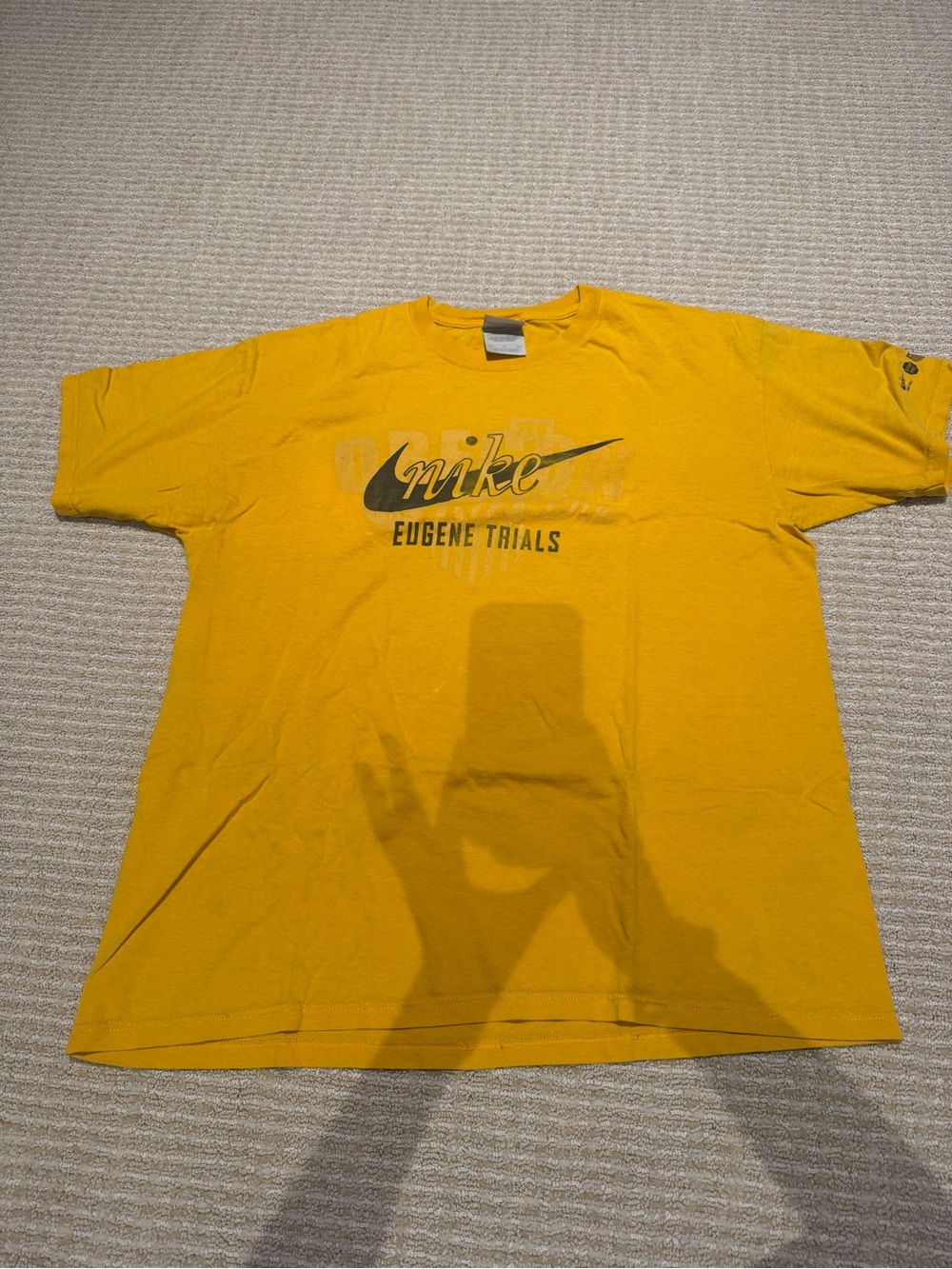 Vintage Nike Men's Eugene Trials Yellow Logo T‑Shirt